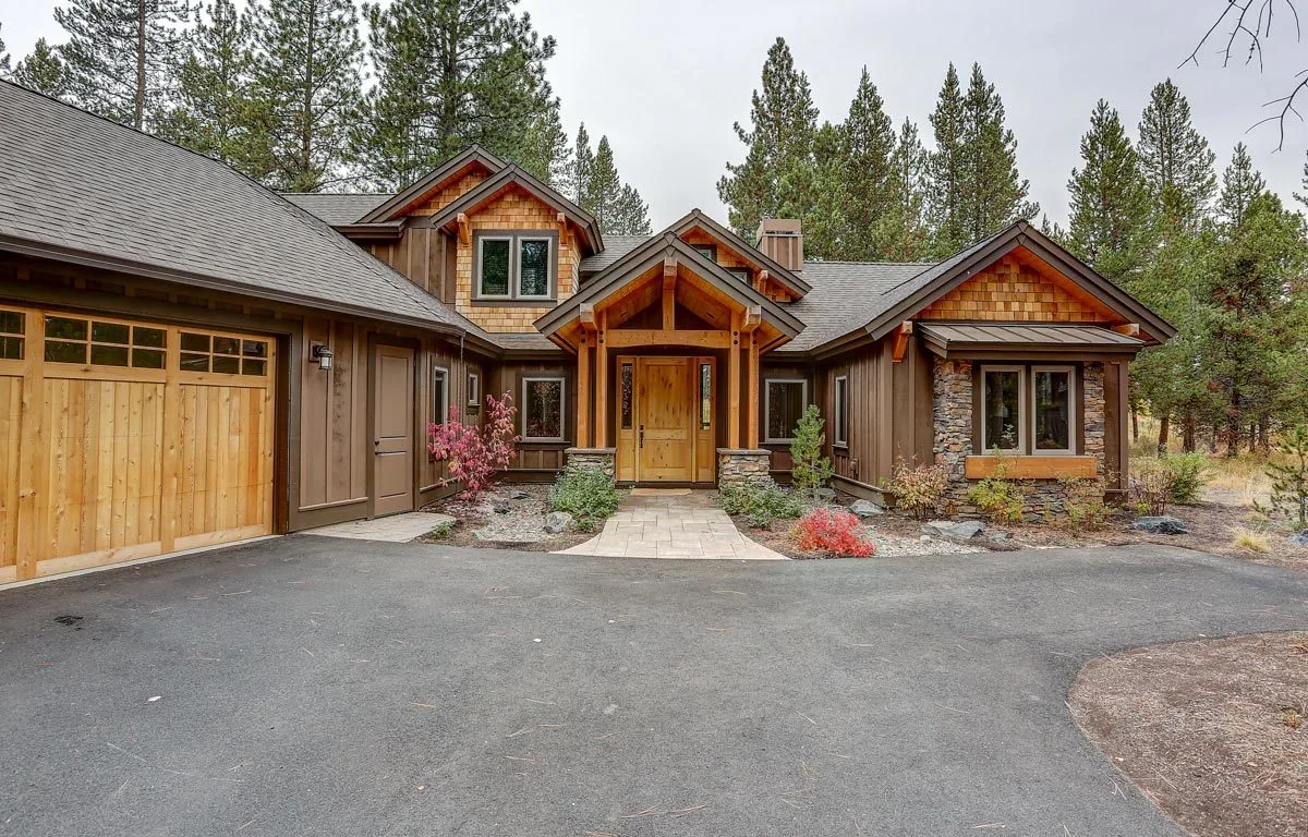 The façade of this house has a different wood-style appearance.