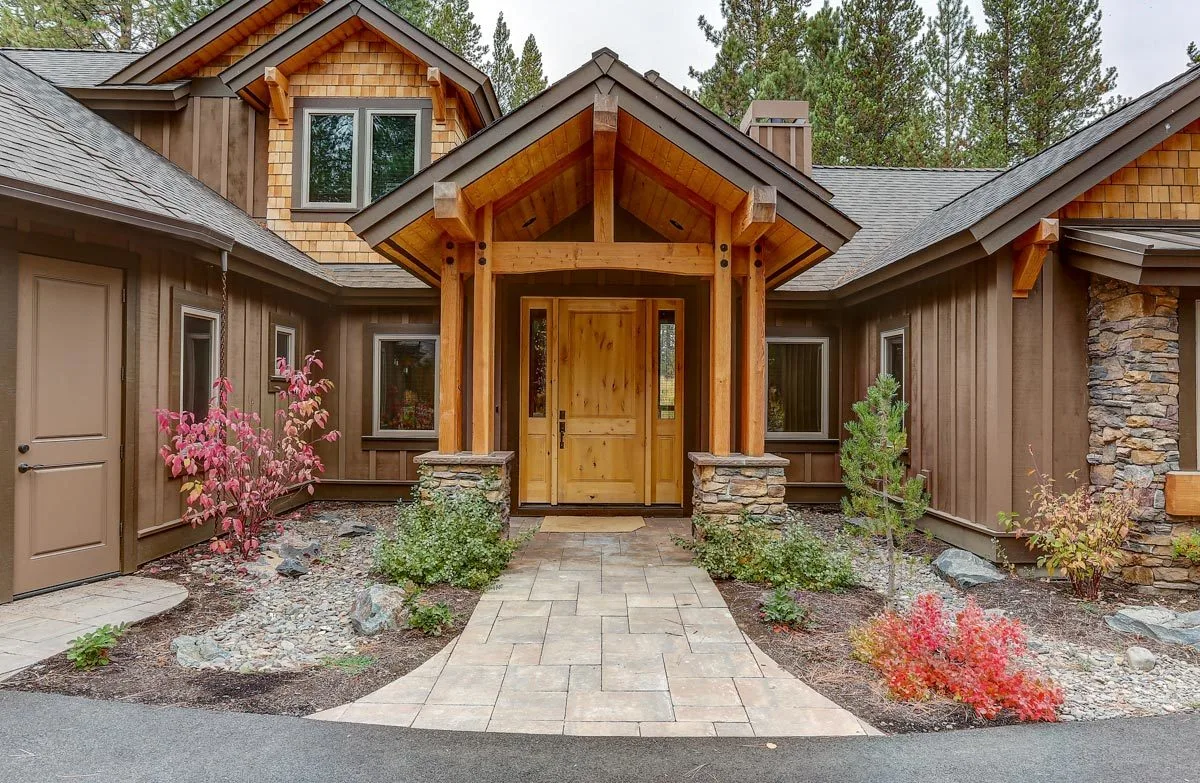 A little landscaping is present at the front of the home.