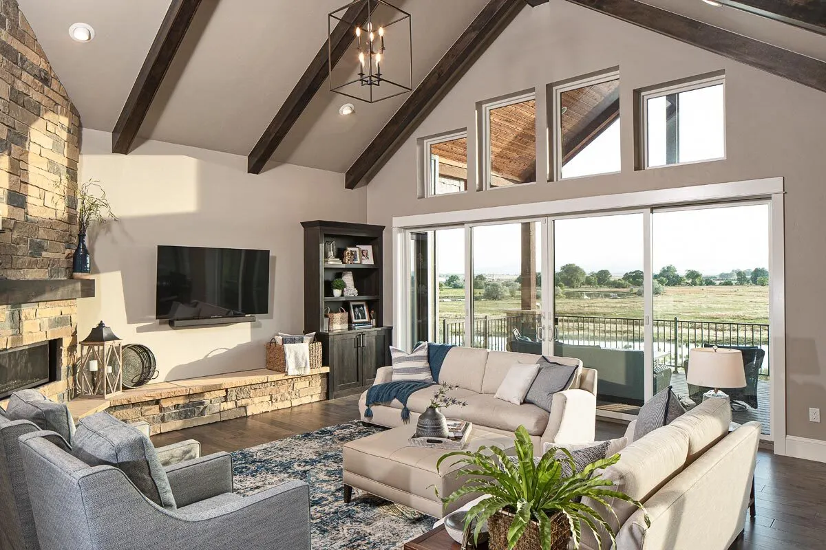 The great room area with a vaulted ceiling features.