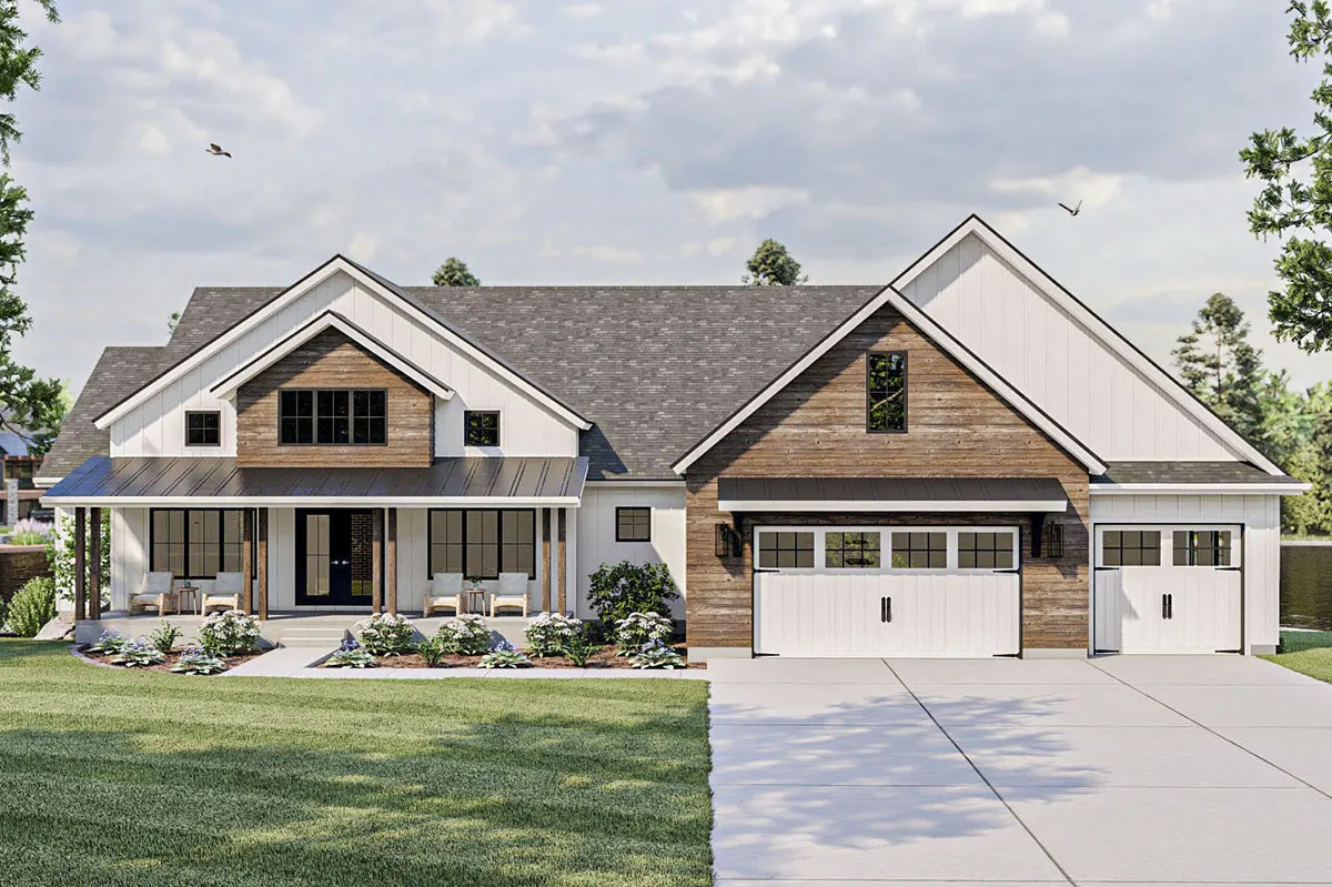 The house has a modern front aspect with a black and white painted façade and wooden accent walls.