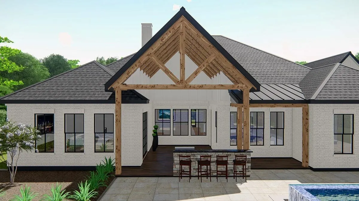 The patio's dark oak flooring compliments the exposed ceiling beams and pillars.