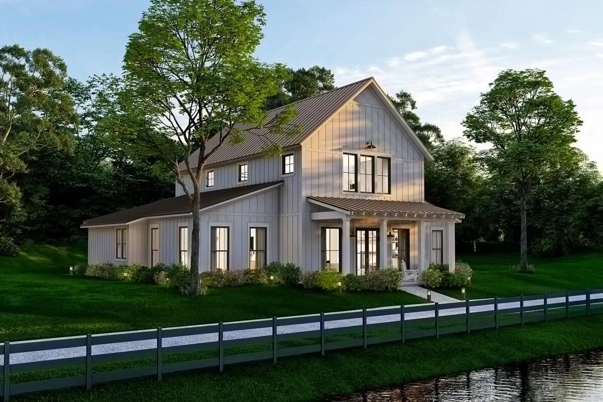 The home looks cozy and cool at night, making it a relaxing place to be.