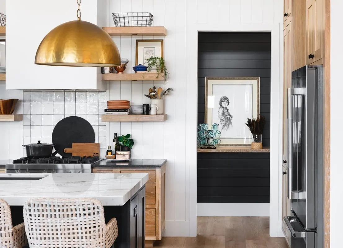 A classic-style kitchen with an island in a modern style aesthetics