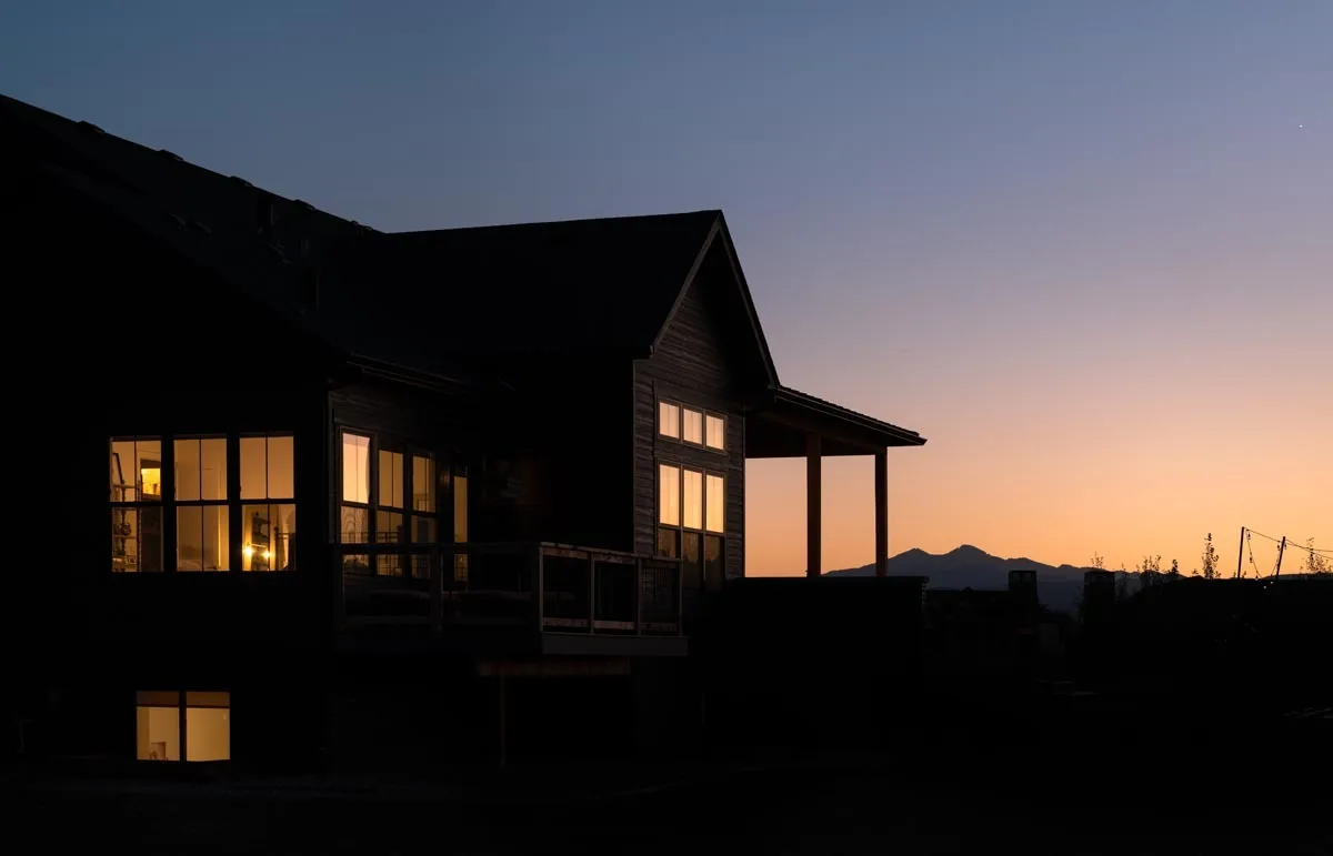 View of the house at night amid the gorgeous surroundings of the place