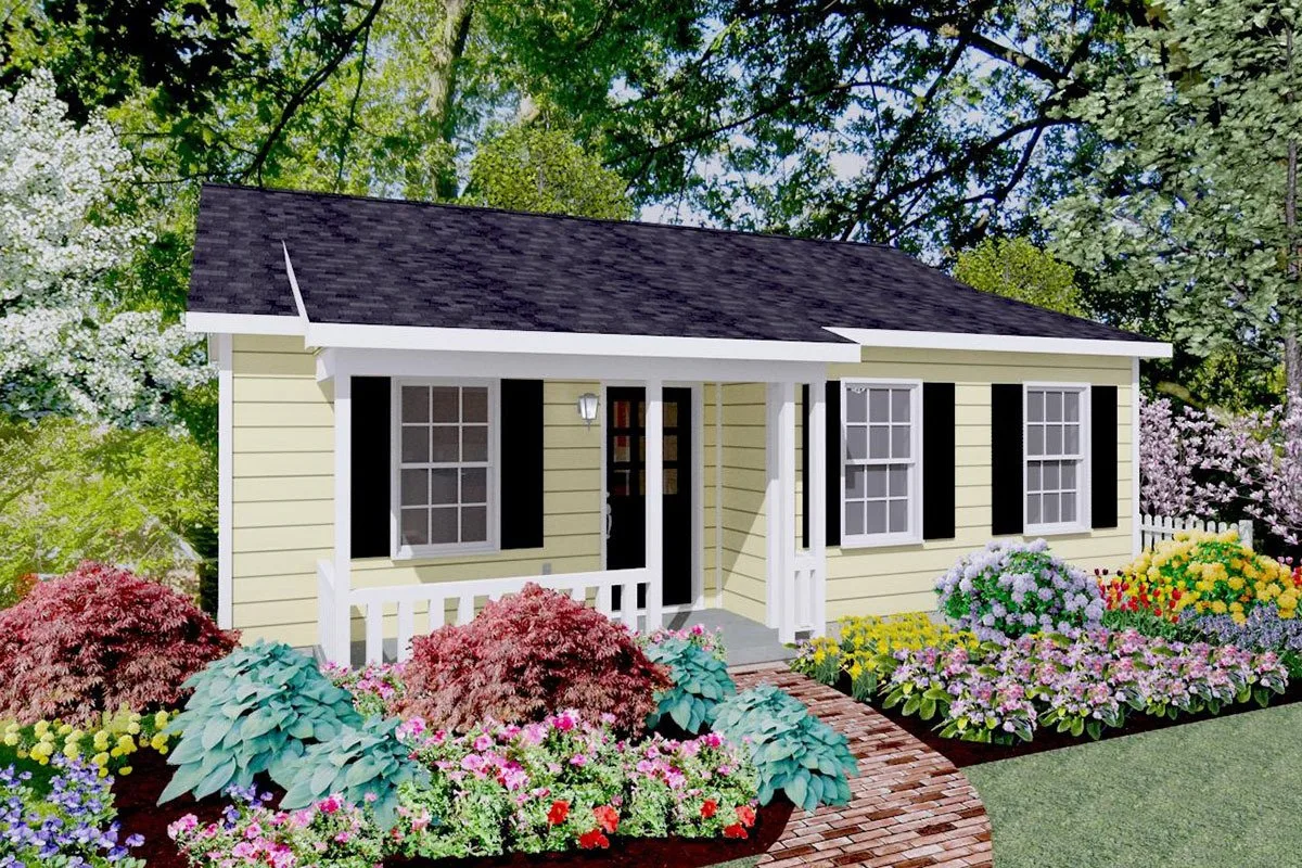 Exterior shade of the cottage house merges in with the porch area to have a soothing view of the surroundings.