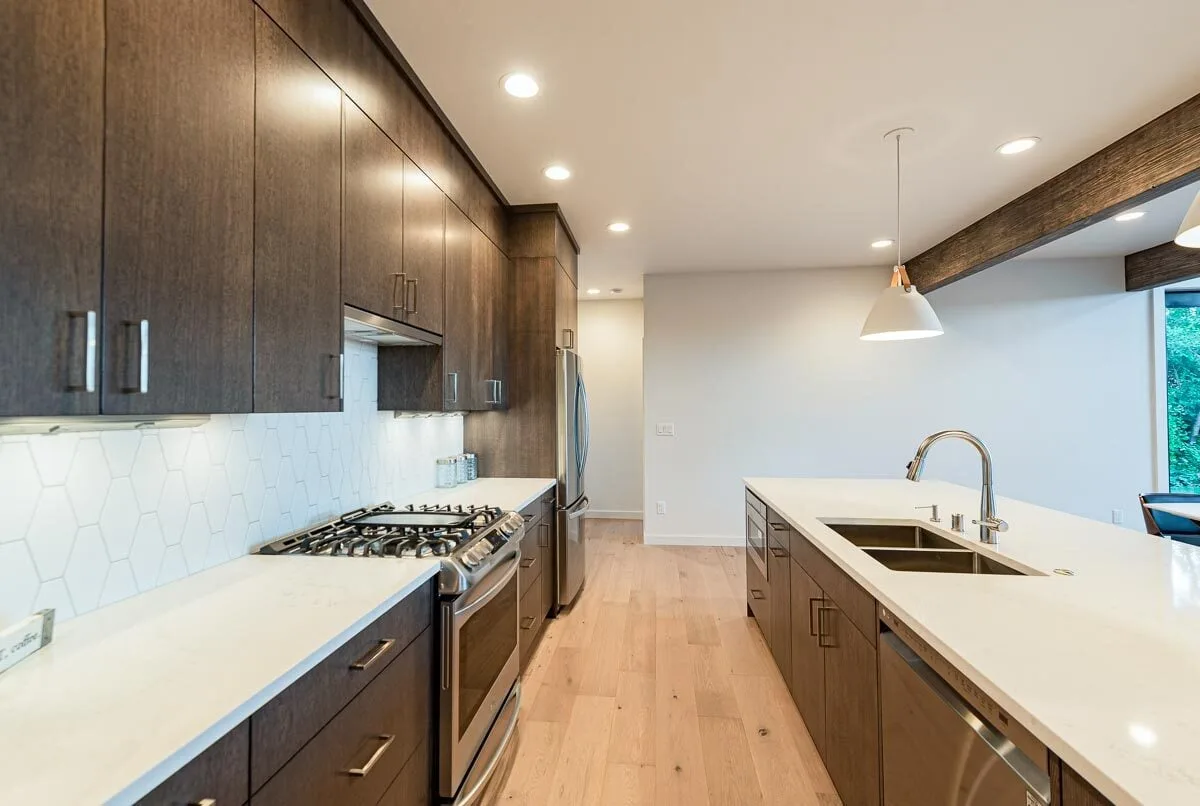 The entirety of the kitchen's appliances in stainless steel.