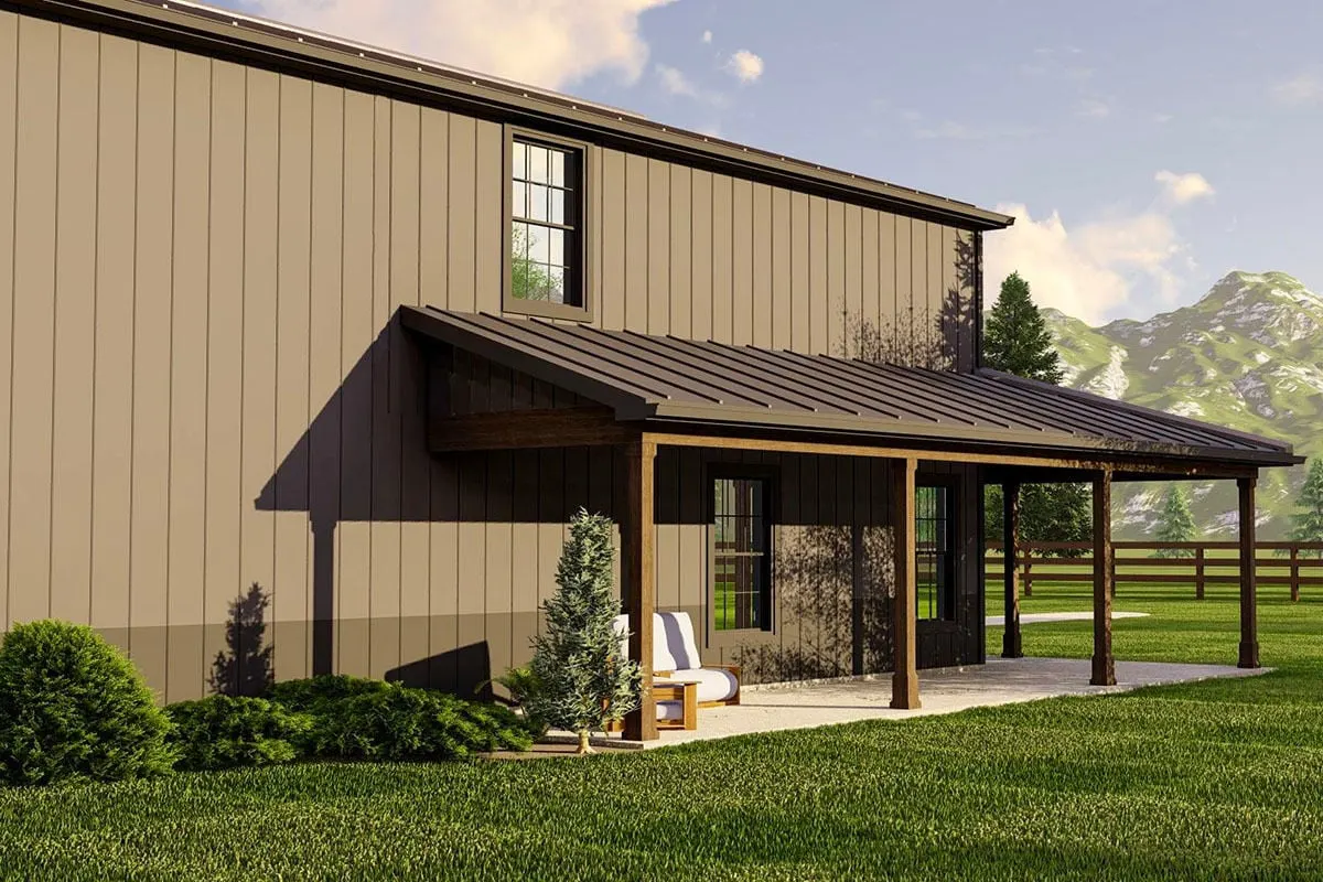 The home is surrounded by a back porch space and landscape.