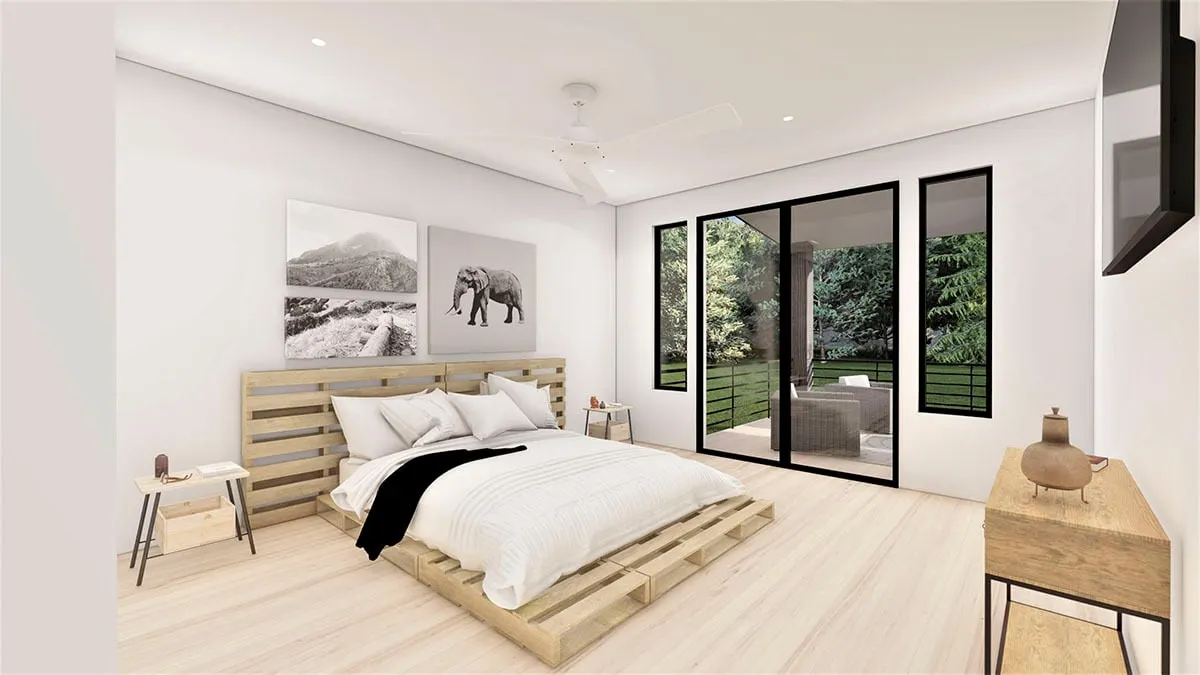 A rustic-style master bedroom with a bedframe made of wood pallets.
