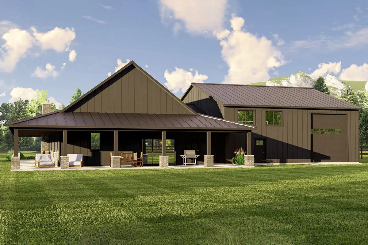 The rear of the home has a cozy porch, seating, and a table.