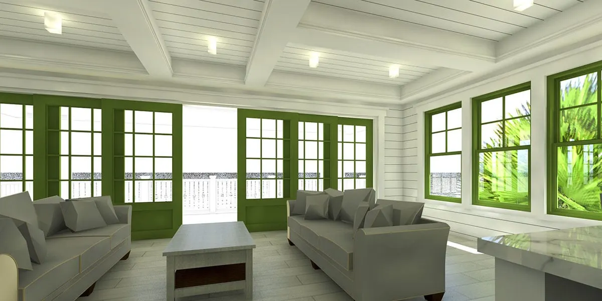 A serene living room space with lovely green sliding doors and window frames.