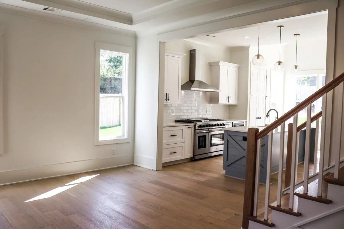 Natural light is added to the inside by the vertical window in white trim.