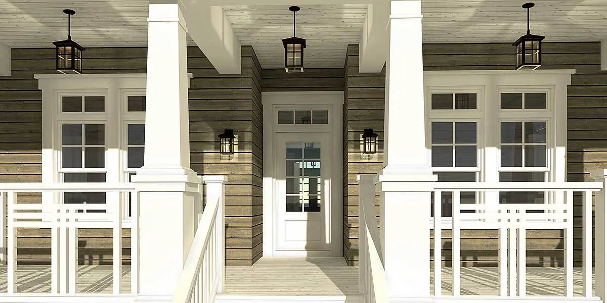 Main entrance of the house in white painted doors with matching windows.
