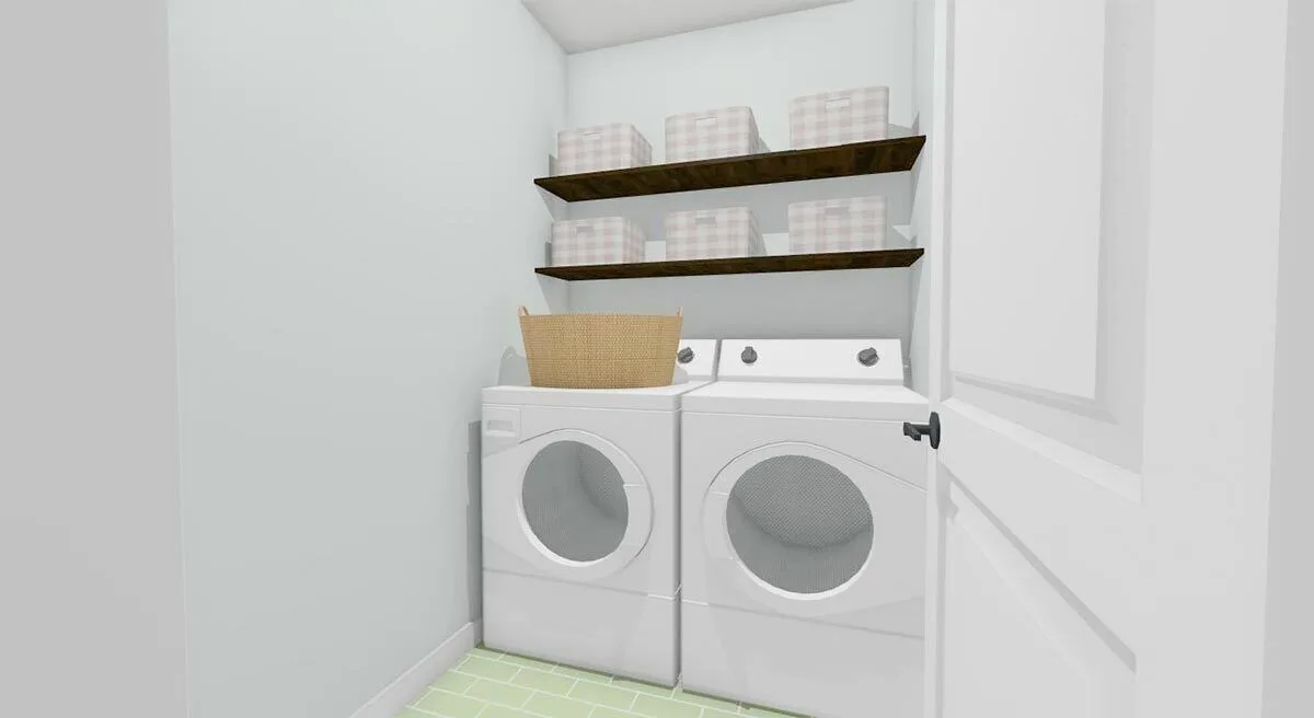 A washer and dryer that are fitted in the laundry room.