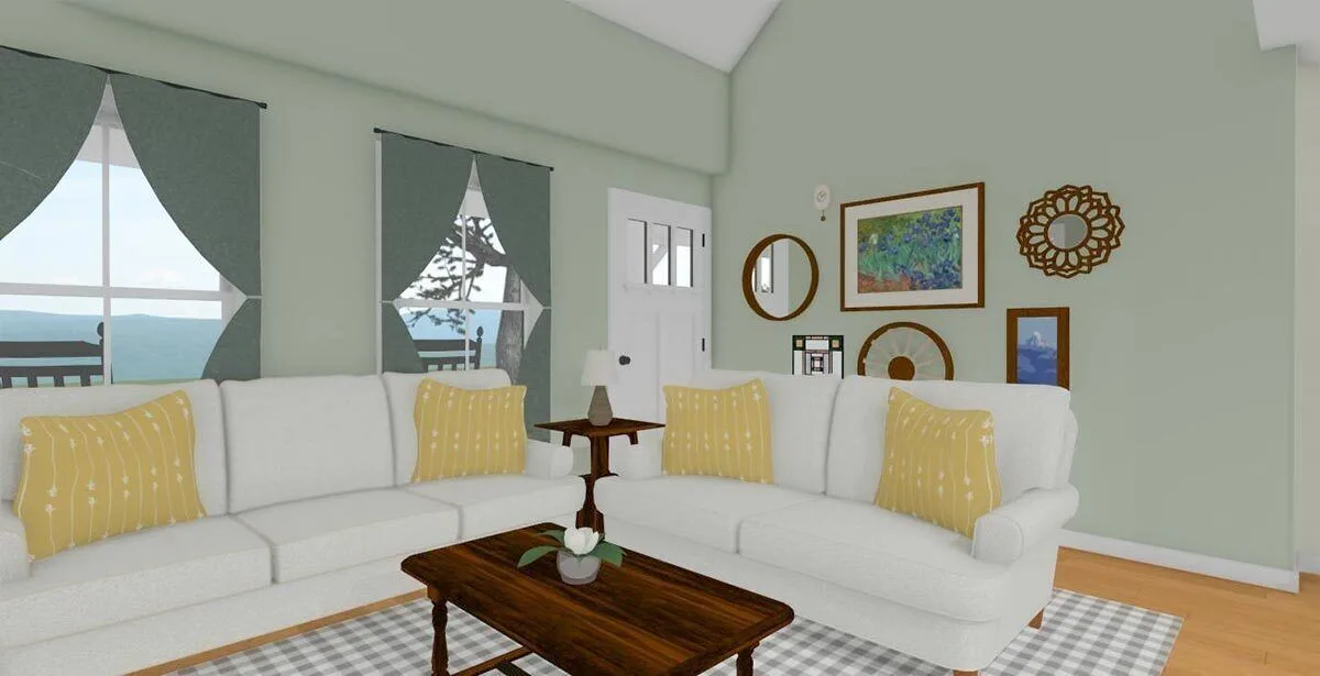 The living room's white couch and yellow throw pillows go well together.
