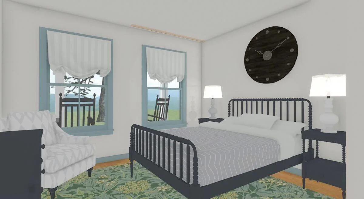 The bedroom area's white walls and gray furniture go well together.