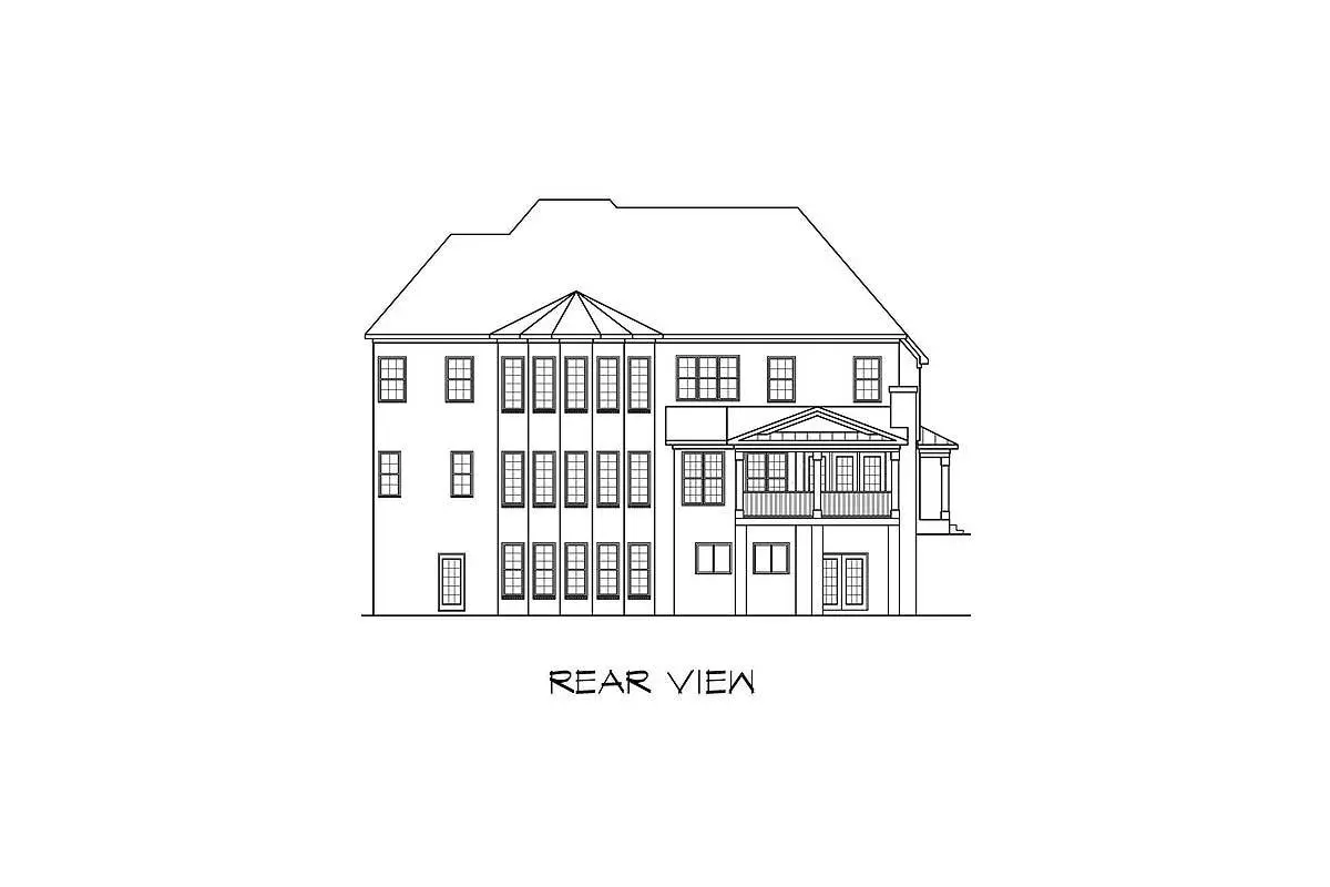 Rear elevation of a two-story, five-bedroom European traditional home.