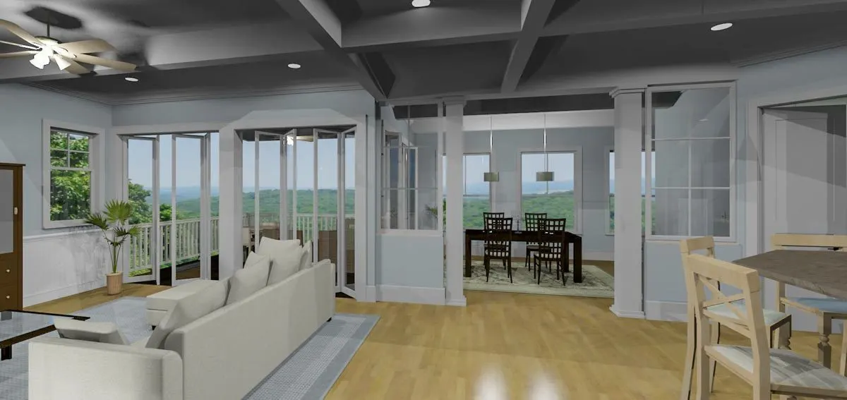A spacious living room with a visible dining space and a beautiful porch.