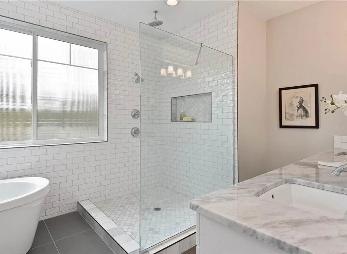 The glass bathroom, and a window beside it. 