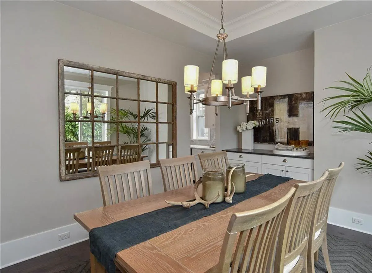 Another view of the dining area showing the artistic mirror wall that gives the final touch of sophisticated yet modernized craftsmen house.