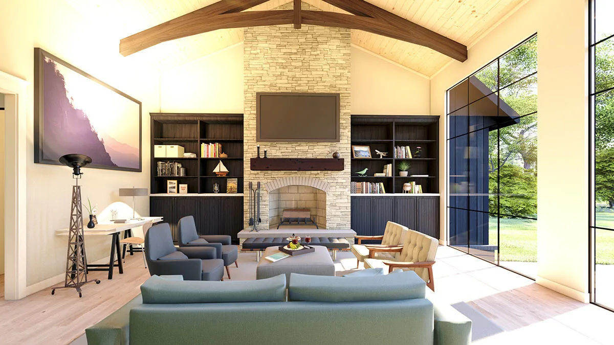 Large windows in the living room area give it a spacious appearance.