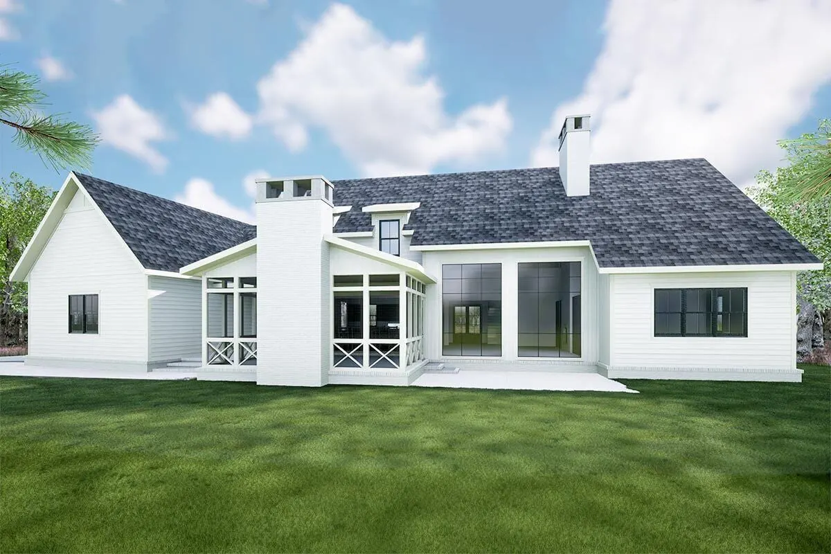 The back of the home has a screened porch with a wood-burning fireplace.