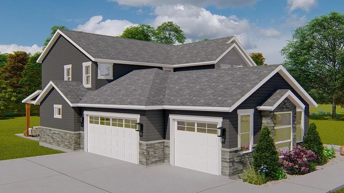 The wide driveway and stylish wooden garage door.