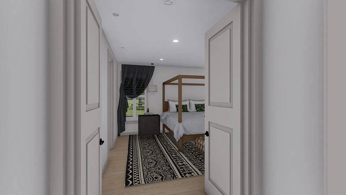 The bedroom space has an open double door with white paint.
