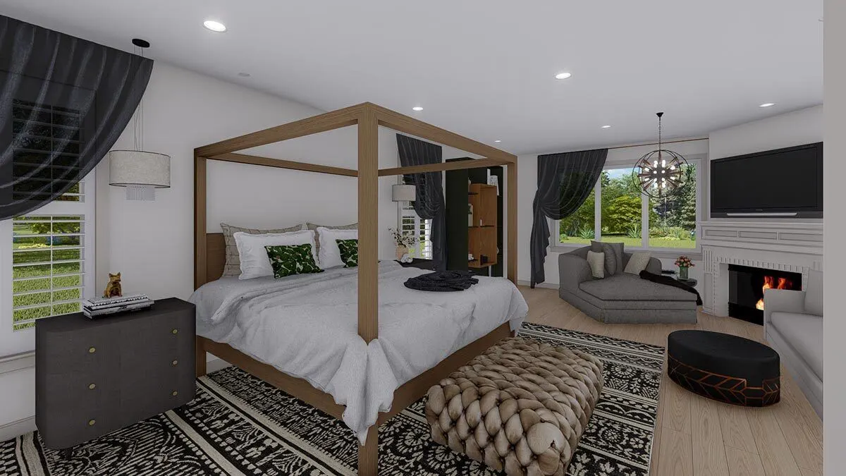 Elegant master bedroom with fireplace to keep the space warm.