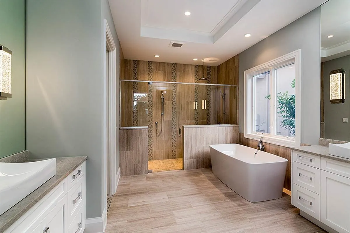 Bathroom in a minimalist design with a light brown color accent.