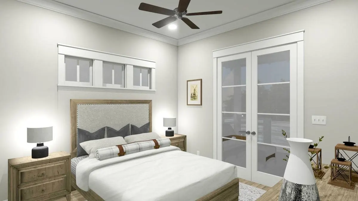 Comfortable master bedroom with a big door leading to the rear porch.