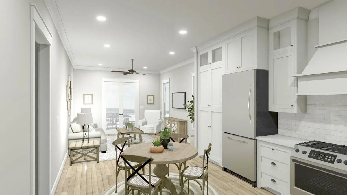 Sofas and a center table with a wood accent structure are in the living room area.