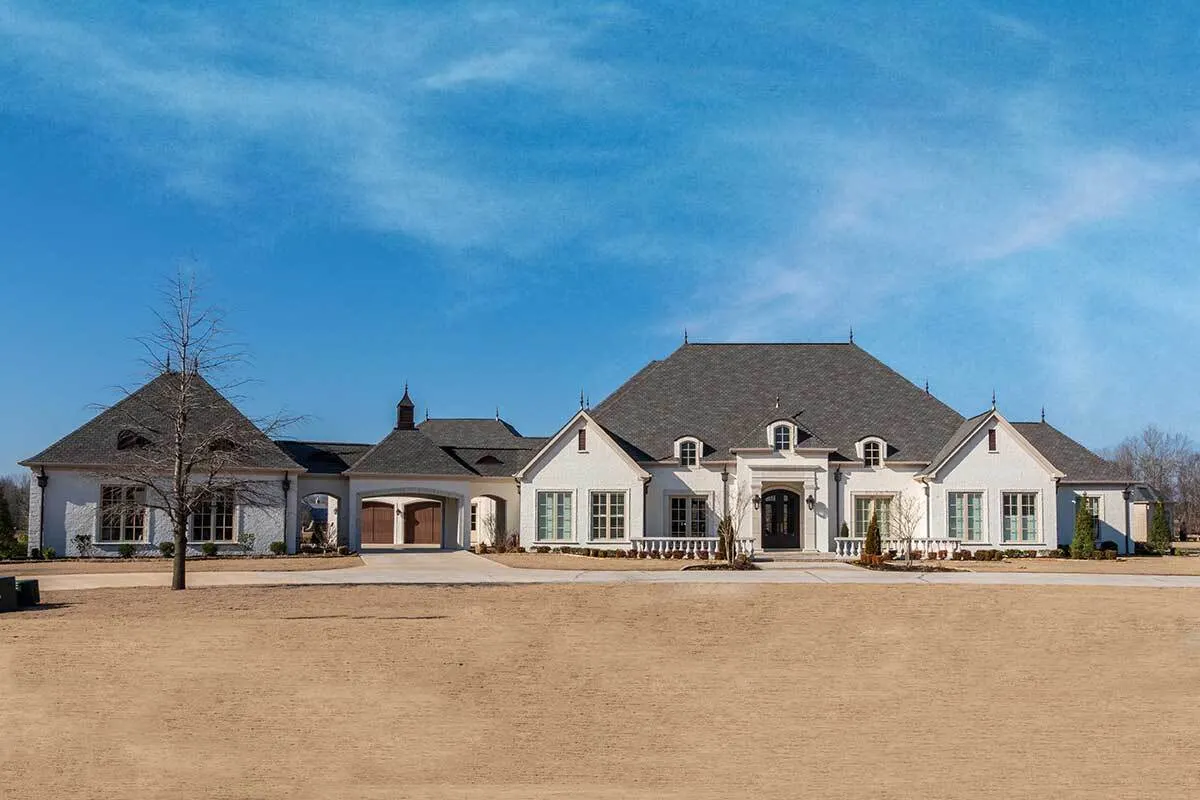 A remarkable Porte-cochere between the garage and the home.