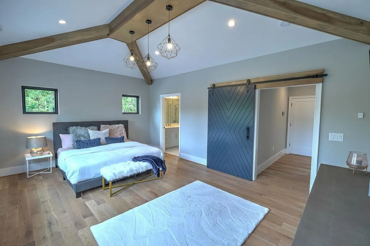 Bedroom in aesthetically design decors with bath and walk-in closet.