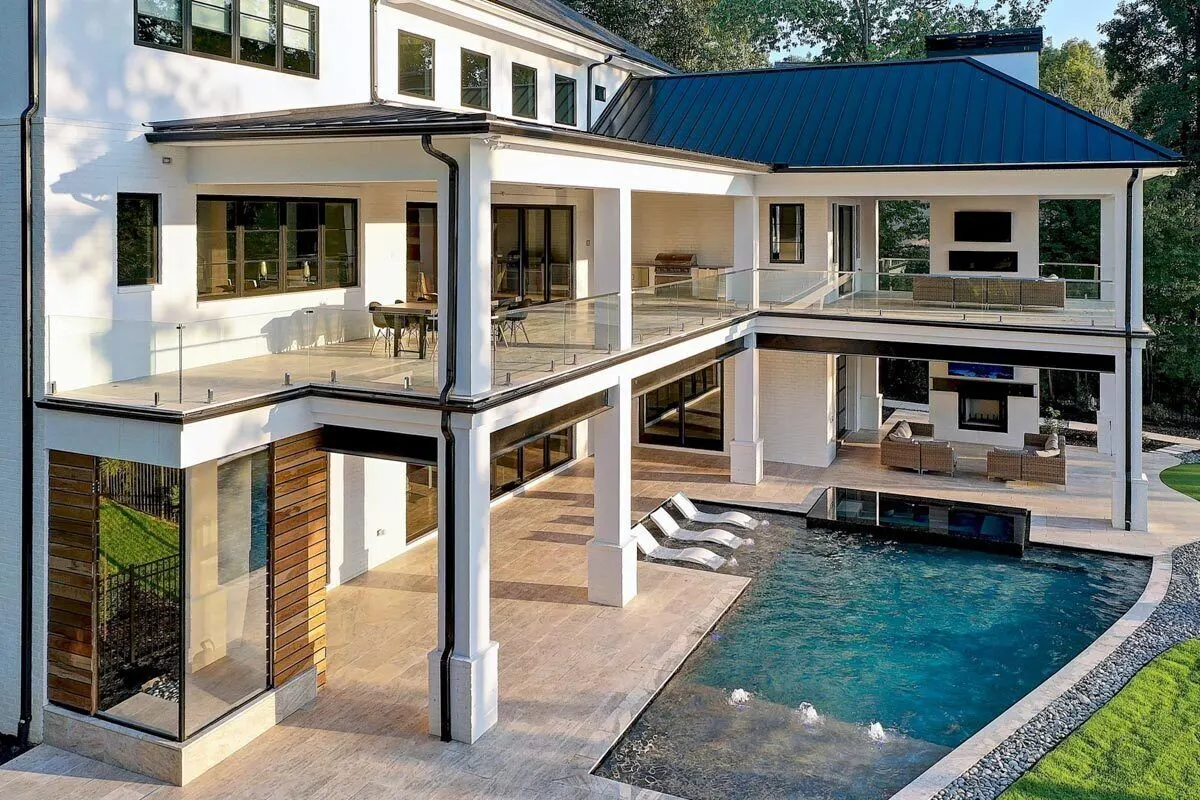 Couches all over porch and patio for ultimate relax seating with pool view.