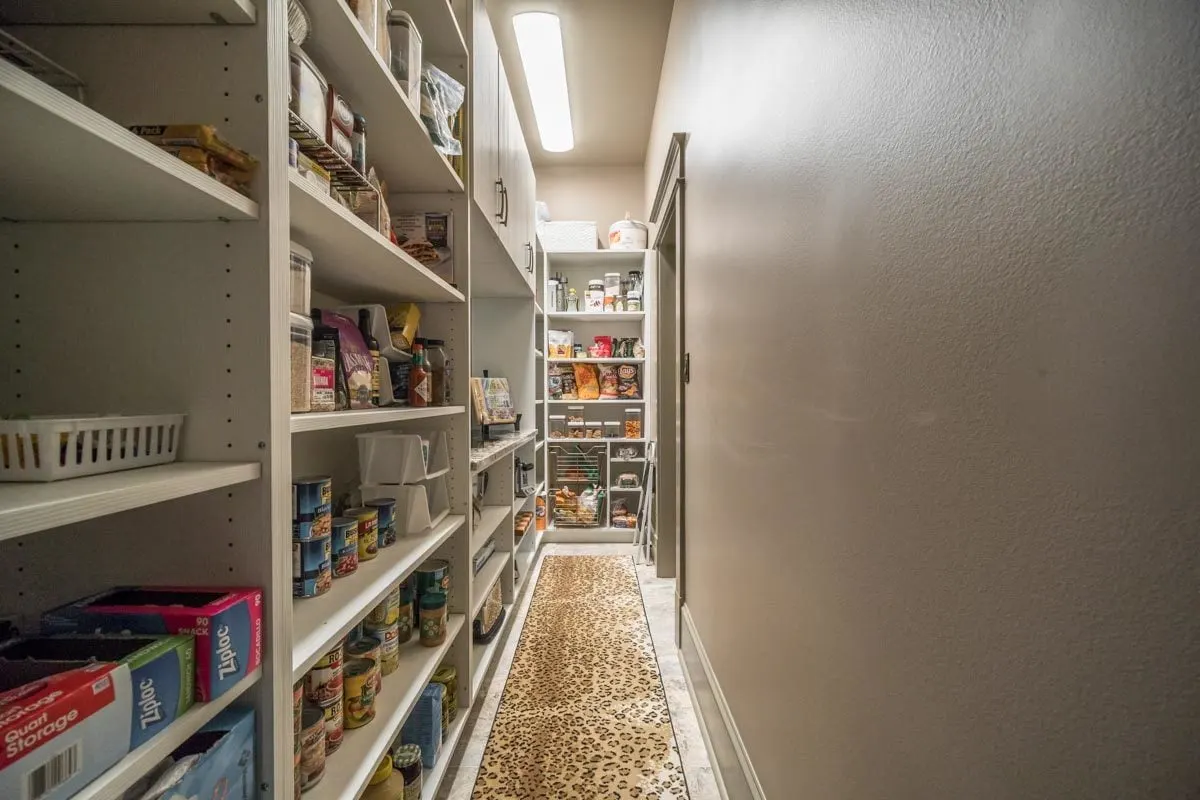 Large spacious butler-walk-in pantry area.