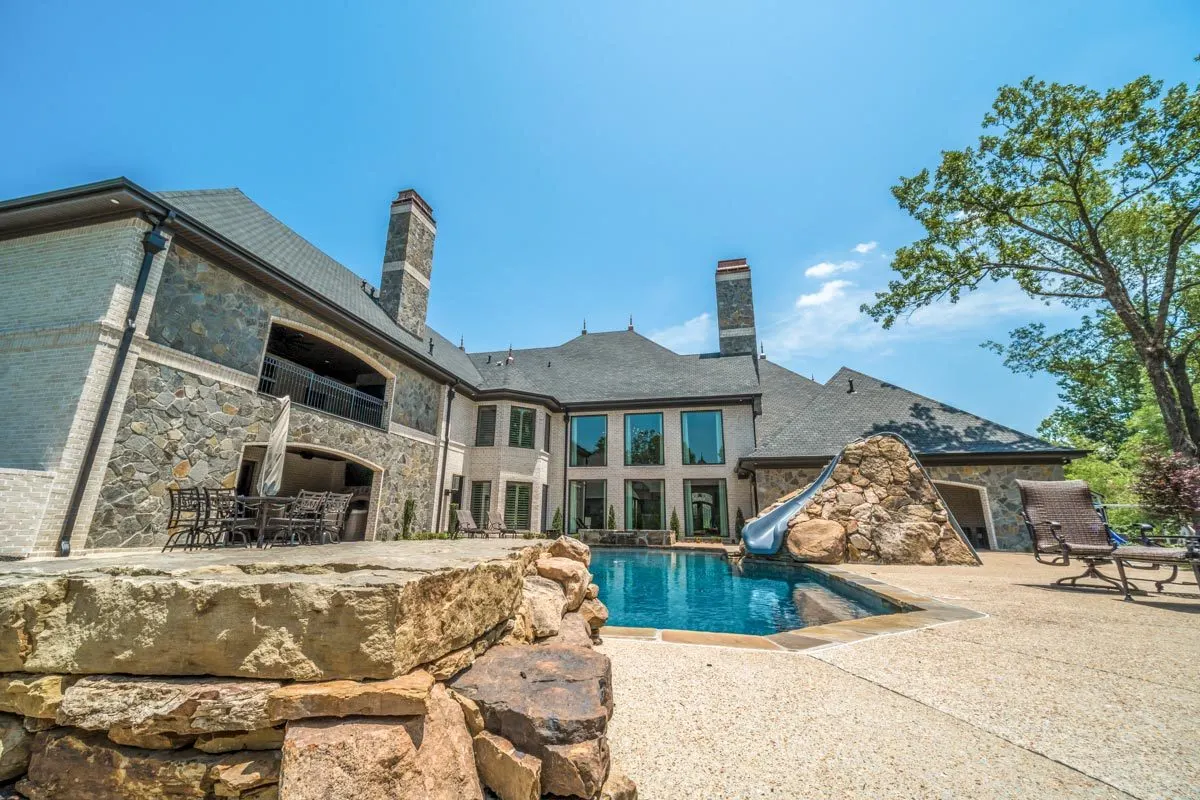 At the back of the property, spectacular rock landscaping provides curb appeal.