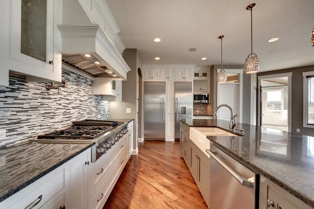 The kitchen has matching countertops and modular cabinets.