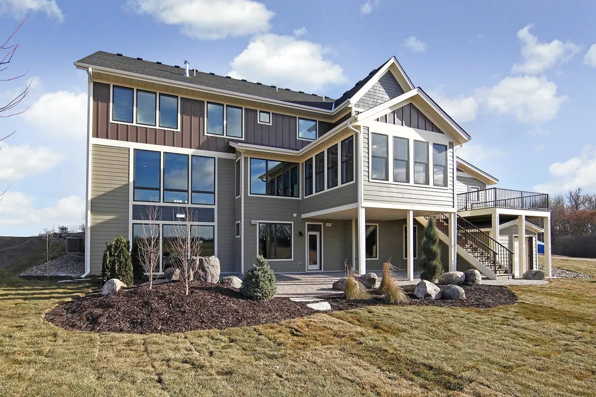 Large rocks were used to landscape the yard near patio.
