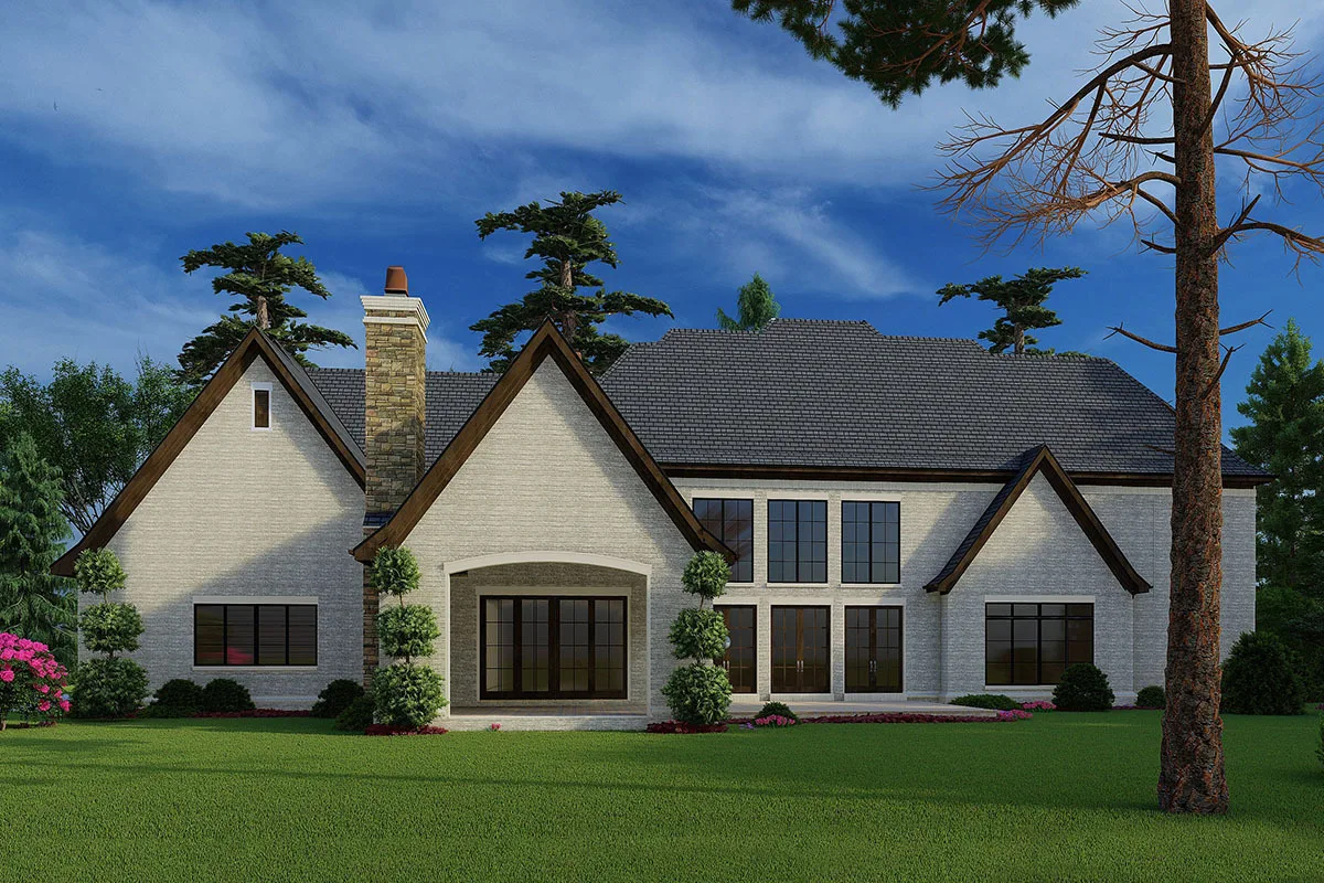 The back of the home features an eye-catching three-triangle roof style.