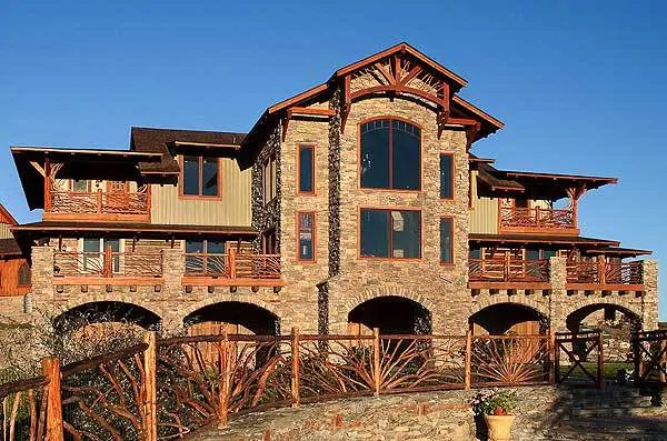 A different version of the home with a brown façade and wood accents.