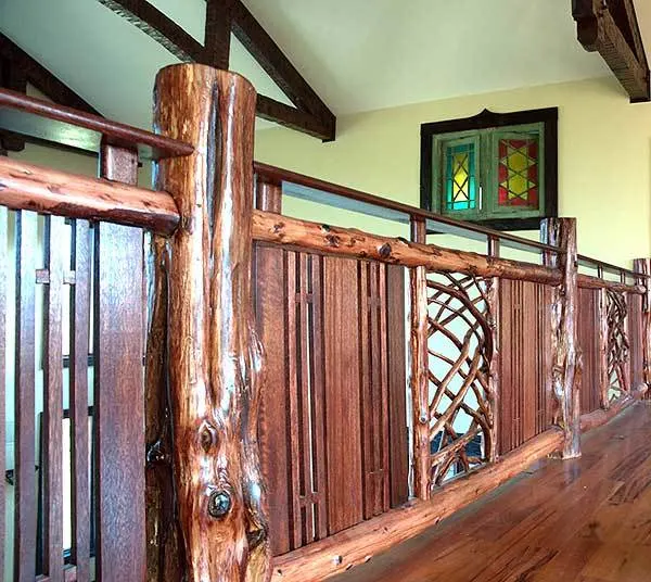 The attractive appearance of the floor and accent railing is made of solid wood.