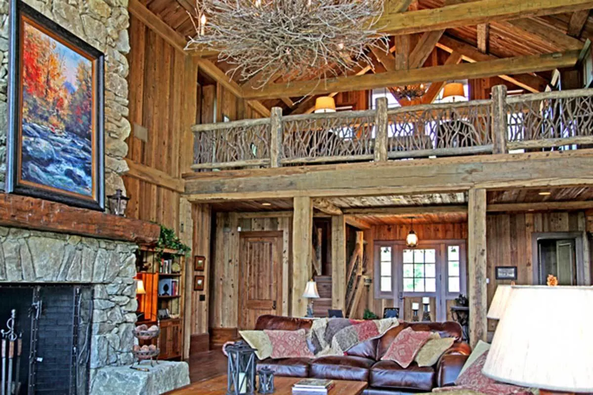 Stunning solid wood craftsmanship can be seen from the main level looking up to the loft space.