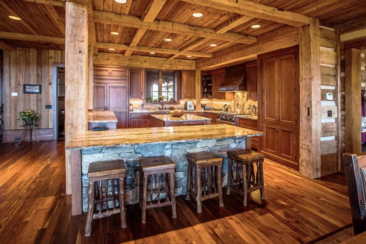 Marble countertops and stone-style islands in the kitchen.
