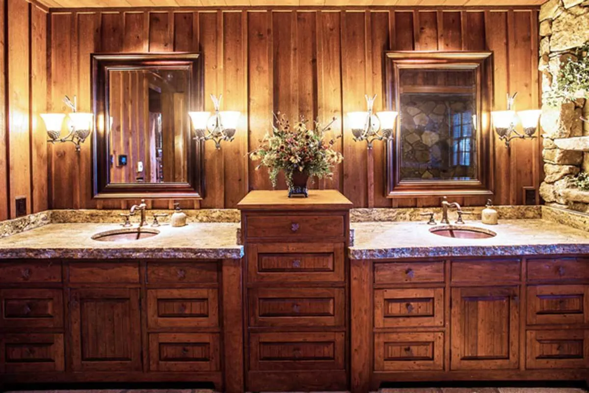 Vanities with little landscaping stone designs in the right corner.