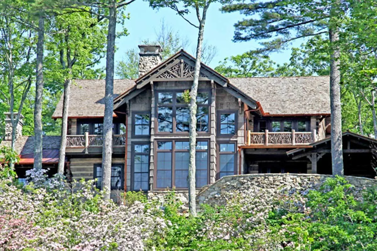 The home's second-level porches are visible on both sides in the rear picture.