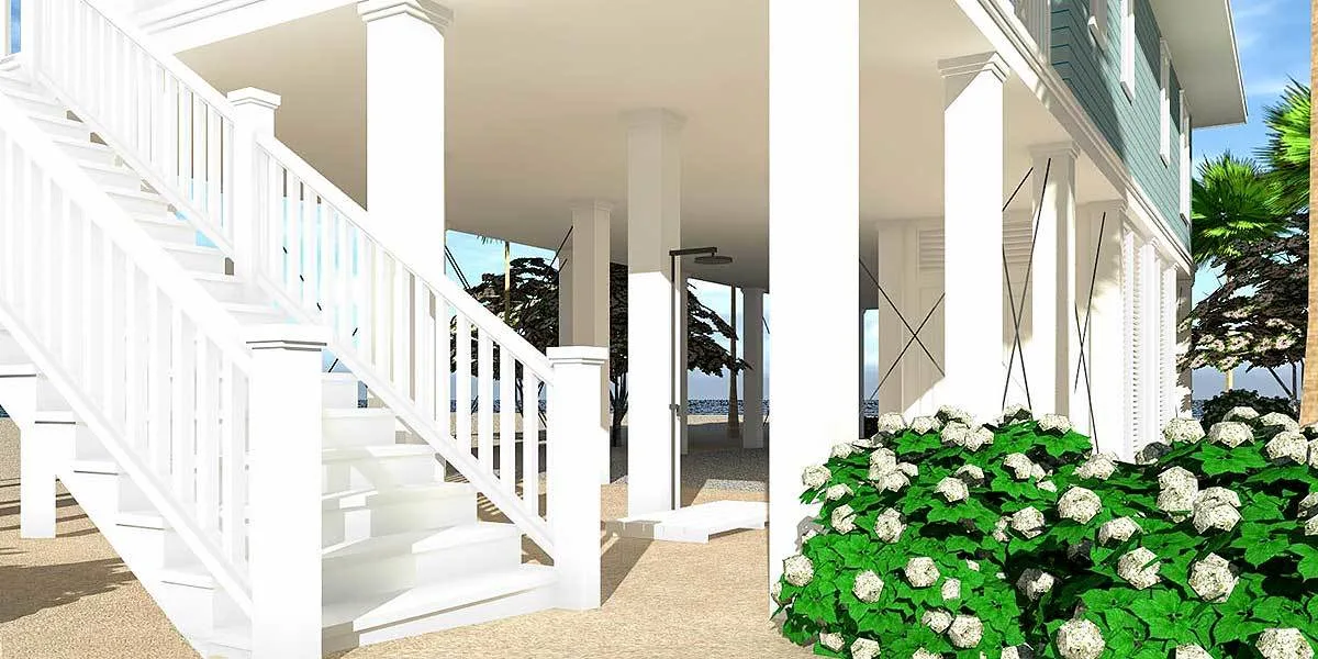 The beach house's sturdy pillars and stairs are painted in crisp white color.