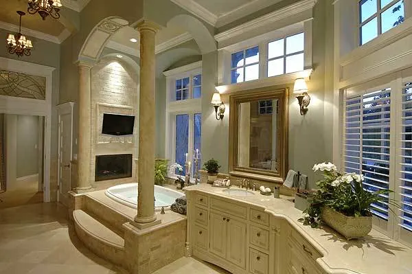 Master bathroom elegant design in beige color interior with tub and vanity.