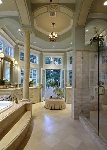 The master bathroom features a door to the deck area.