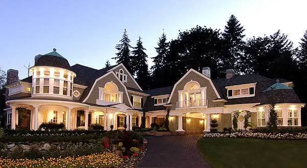 The front of the house has a large landscaping element that improves curb appeal.