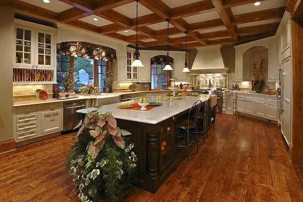 An oval-shaped kitchen area with Christmas decorations.
